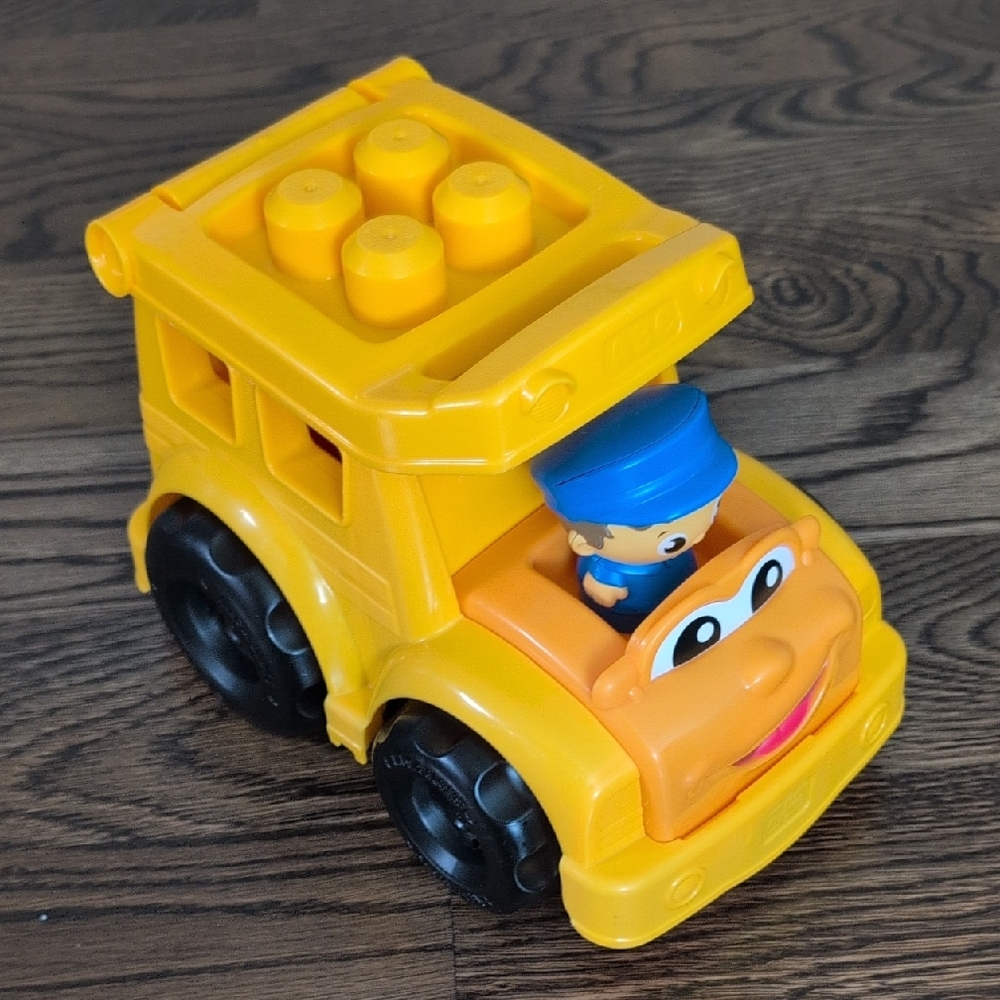 Yellow Toy Truck with Driver & Bricks (Megabloks)